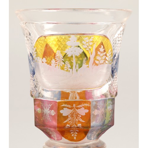 227 - Bohemian glass beaker with engraved hunting scene, clear with pink,blue and amber flashed decoration... 