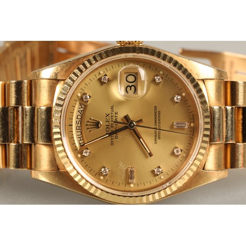 116 - Rolex Oyster Perpetual Day-Date 18k gold Gentleman's wrist watch. Gold coloured dial with Diamond ho... 