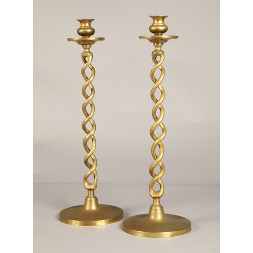 253 - Pair of Barley twist brass candlesticks, 47.5cm high.