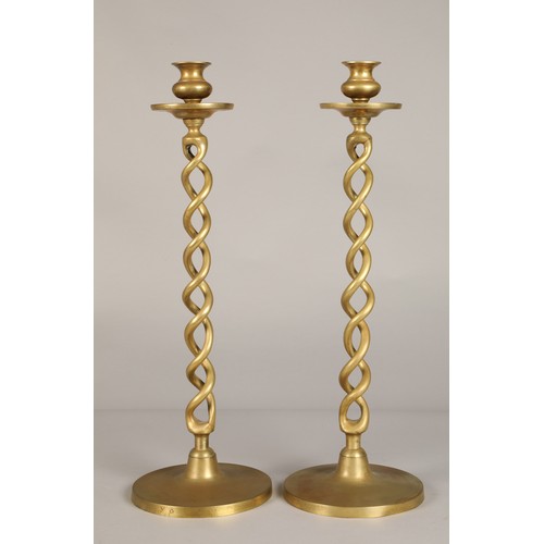 253 - Pair of Barley twist brass candlesticks, 47.5cm high.