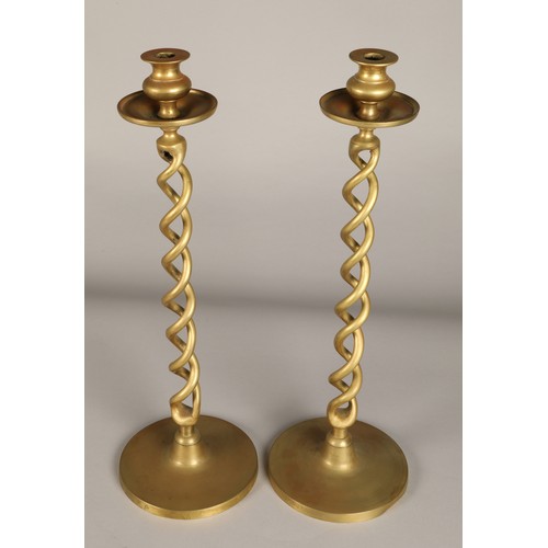 253 - Pair of Barley twist brass candlesticks, 47.5cm high.