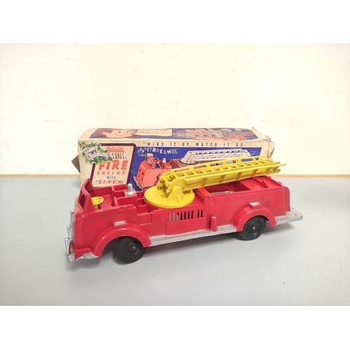 138 - Triang. Vintage tinplate KL 44 model Jones Mobile Crane. Red body, with black base and litho-printed... 