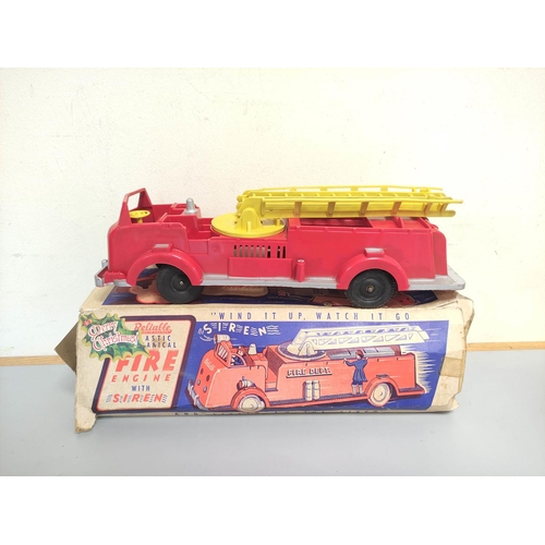 138 - Triang. Vintage tinplate KL 44 model Jones Mobile Crane. Red body, with black base and litho-printed... 