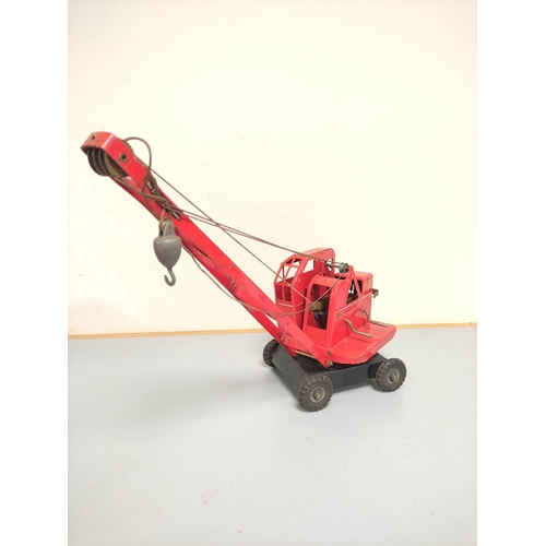 138 - Triang. Vintage tinplate KL 44 model Jones Mobile Crane. Red body, with black base and litho-printed... 