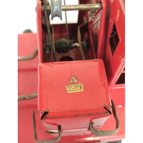 138 - Triang. Vintage tinplate KL 44 model Jones Mobile Crane. Red body, with black base and litho-printed... 