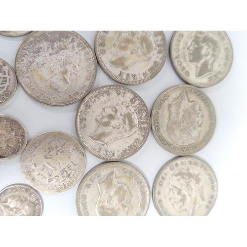 336 - Collection of British and World silver coins to include 162.9g of .500 grade silver coins to include... 