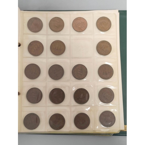 340 - Two folders of British coinage ascending from pennies to shillings and to include Victorian-Elizabet... 