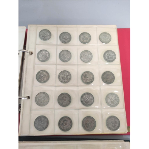 340 - Two folders of British coinage ascending from pennies to shillings and to include Victorian-Elizabet... 