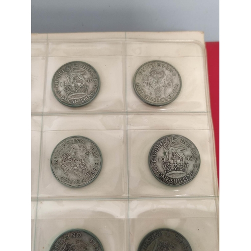 340 - Two folders of British coinage ascending from pennies to shillings and to include Victorian-Elizabet... 