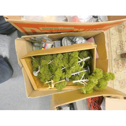 501 - Three boxes of 00 gauge railway effects, transformers, model trees, buildings, etc.