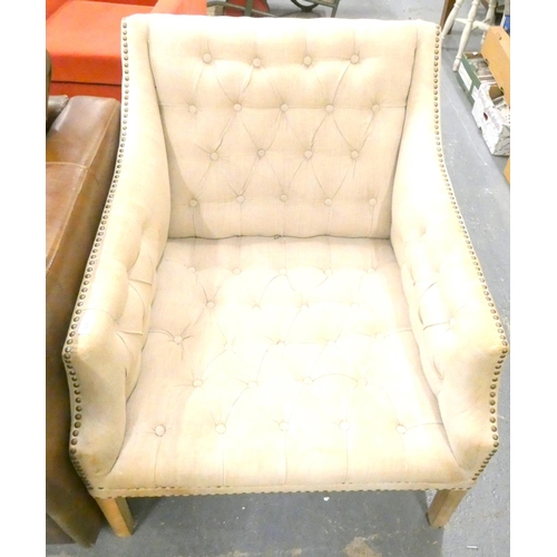 508 - Large modern button back cream arm chair with studded arms in the Georgian style.