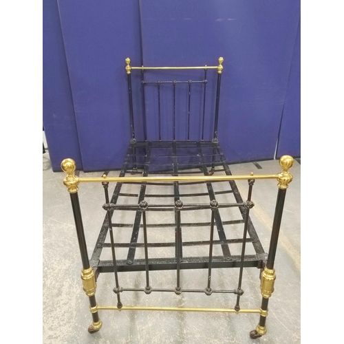 512 - Victorian cast iron and brass single bed with base, 124cm high, 94cm wide.