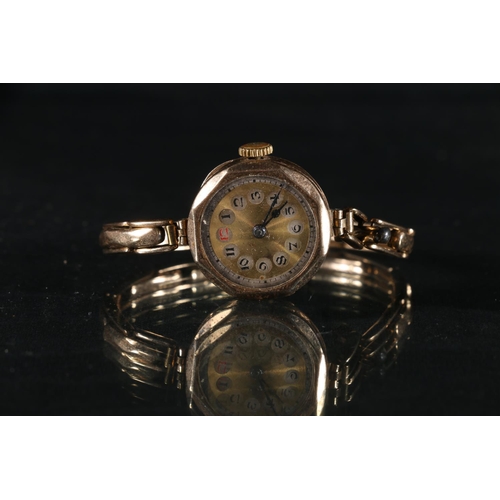 265 - Ladies 9ct gold wristwatch on 9ct gold flex link bracelet, 18g gross,