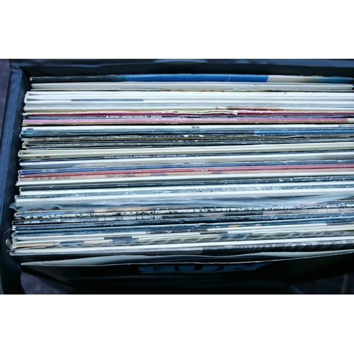 1649 - Record case containing a mix of artist to include Gun, Inxs, George Michael, Seal, Tina Turner and a... 