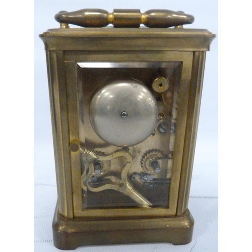 189 - Brass four glass carriage clock with movement viewing window to the top, 12cm high, with tooled case... 