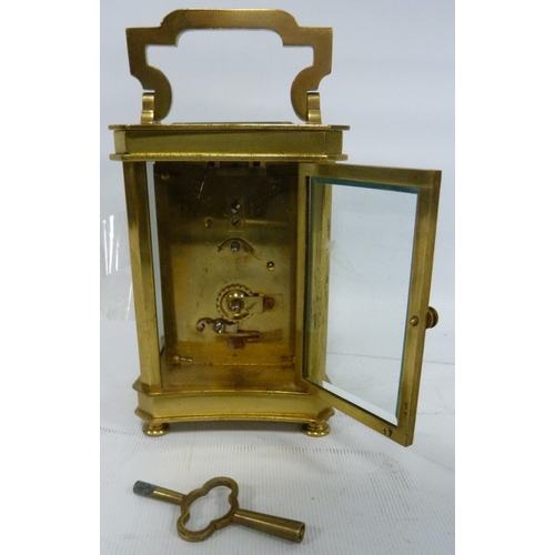 190 - Brass and gilt four glass carriage clock with movement viewing window to the top, inscribed to the e... 