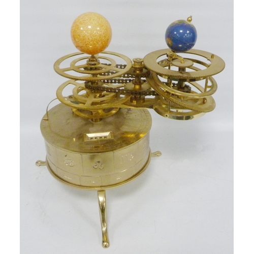 192 - Replica brass and gilt revolving three planet orrery with chain-driven mechanism, on a cylinder base... 