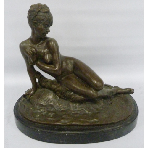 407 - After Mme Léon Bertaux (French, 1825 - 1909)Bronze statue modelled as a nude female reclining on a n... 