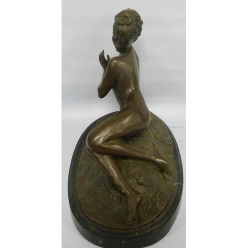 407 - After Mme Léon Bertaux (French, 1825 - 1909)Bronze statue modelled as a nude female reclining on a n... 