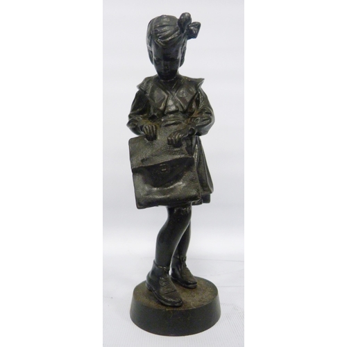 408 - Soviet Russian cast iron figure by Kasli modelled as a schoolgirl with satchel, impressed stamp and ... 