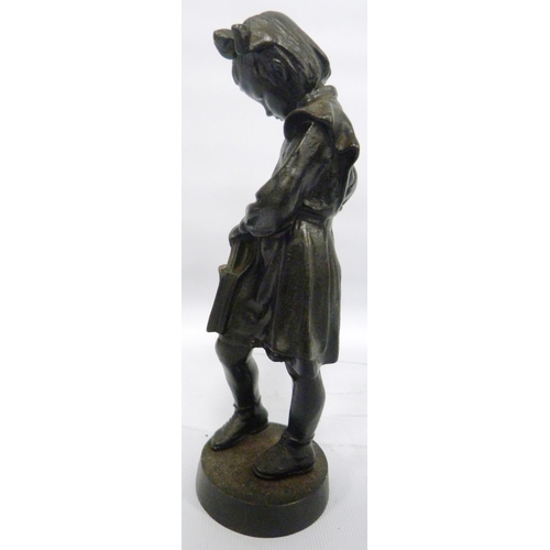 408 - Soviet Russian cast iron figure by Kasli modelled as a schoolgirl with satchel, impressed stamp and ... 