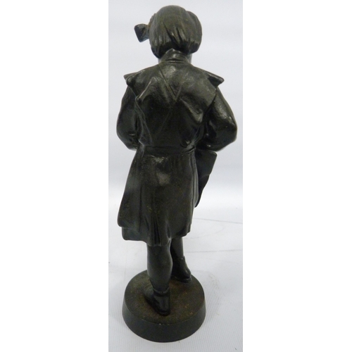 408 - Soviet Russian cast iron figure by Kasli modelled as a schoolgirl with satchel, impressed stamp and ... 