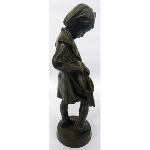 408 - Soviet Russian cast iron figure by Kasli modelled as a schoolgirl with satchel, impressed stamp and ... 