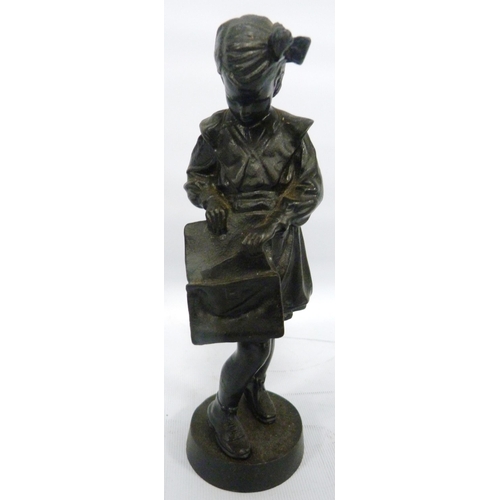 408 - Soviet Russian cast iron figure by Kasli modelled as a schoolgirl with satchel, impressed stamp and ... 