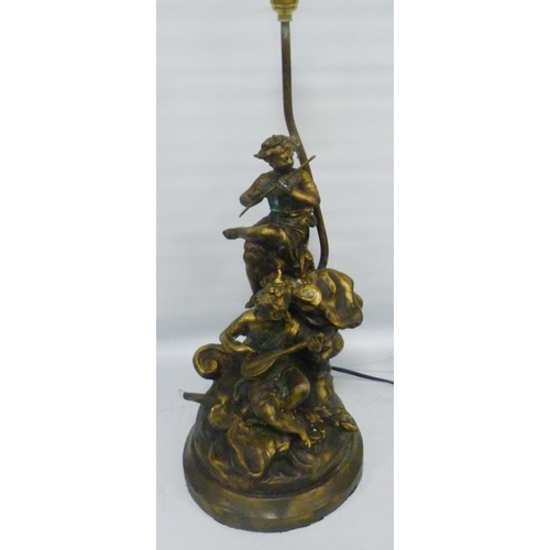 304 - After the OriginalBronzed metal figural table lamp in the form of classical musical figures playing ... 