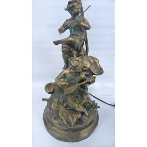 304 - After the OriginalBronzed metal figural table lamp in the form of classical musical figures playing ... 