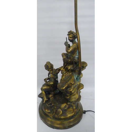 304 - After the OriginalBronzed metal figural table lamp in the form of classical musical figures playing ... 