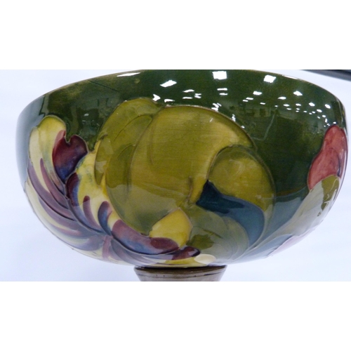 221 - Moorcroft 'Hibiscus' centrepiece bowl with tube-lined decoration on green ground, fixed to a resin b... 