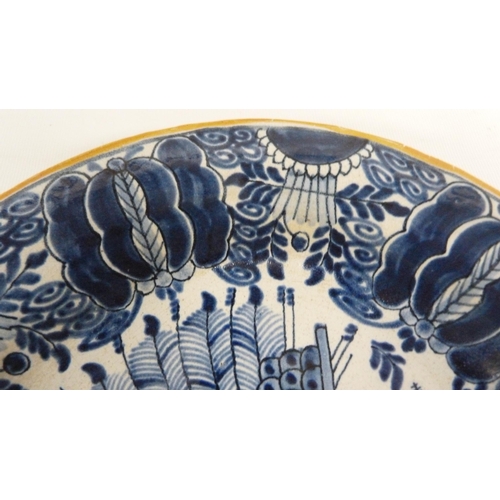 226 - 18th century Delft blue and white pottery faience peacock plate, underglazed in blue on a white grou... 