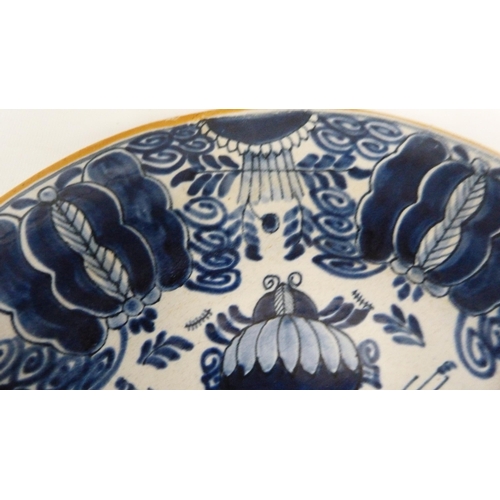 226 - 18th century Delft blue and white pottery faience peacock plate, underglazed in blue on a white grou... 