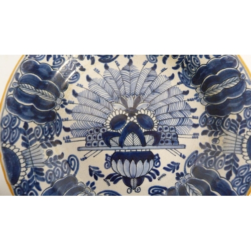 226 - 18th century Delft blue and white pottery faience peacock plate, underglazed in blue on a white grou... 