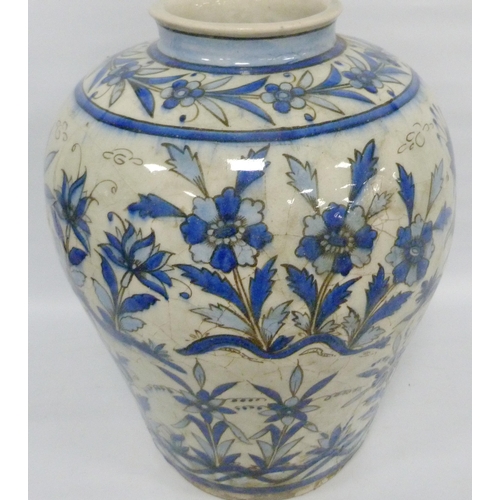 211 - Persian Iznik ovoid pottery vase, probably late 19th century, of large proportions, under glazed wit... 