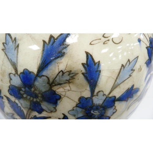 211 - Persian Iznik ovoid pottery vase, probably late 19th century, of large proportions, under glazed wit... 