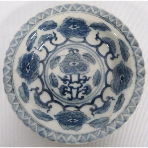 204 - Three Chinese Kraak porcelain shallow blue and white dishes (Kangxi), c. early 18th century, undergl... 