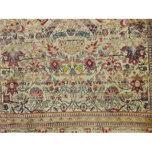 413 - Persian hand-knotted rug with multiple trailing foliate patterns and guard stripes, on cream ground ... 