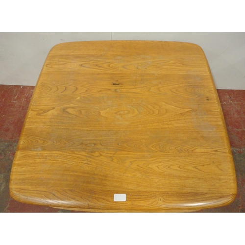 449 - Ercol blonde elm Pandora's Box coffee table of square form with two drawers to one end, flanked by o... 