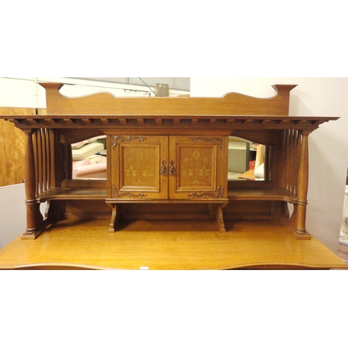 451 - In the Manner of Shapland & Petter of BarnstapleArts & Crafts inlaid oak sideboard, the top ... 