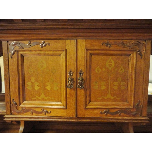 451 - In the Manner of Shapland & Petter of BarnstapleArts & Crafts inlaid oak sideboard, the top ... 