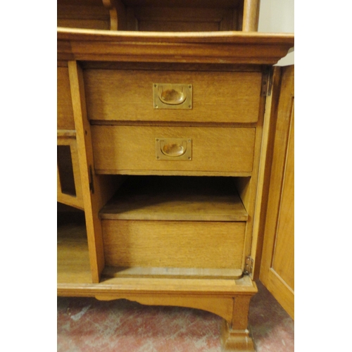 451 - In the Manner of Shapland & Petter of BarnstapleArts & Crafts inlaid oak sideboard, the top ... 