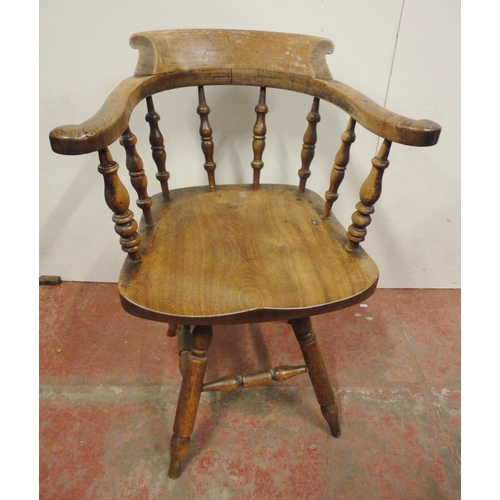 454 - Victorian ash and elm bow-back smoker's or captain's chair, with turned spindle columns and solid se... 