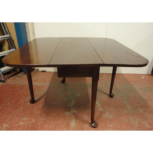 456 - 19th century mahogany dining table with chamfered drop flaps, on tapered legs and pad feet, 71cm hig... 