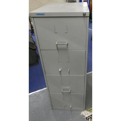 551 - Large metal 4 drawer filling cabinet.