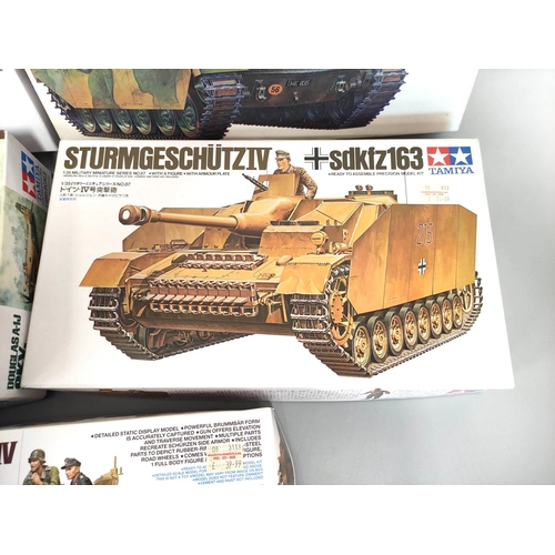 108 - Tamiya. Group of 1:35 scale models to include British Army Chieftain Mk.5 No 68, SdKfz163 No 87, Fla... 