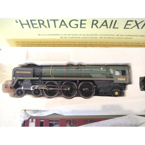 216 - Hornby Railways. Boxed ''Heritage Rail Express'' train set comprising of a 4-6-2 loco & tender &... 