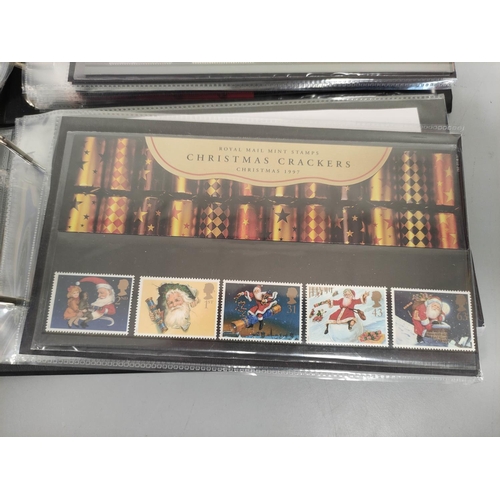 405 - Two albums of c1990s-2000s British mint presentation packs postage stamp sets comprising of 46 first... 