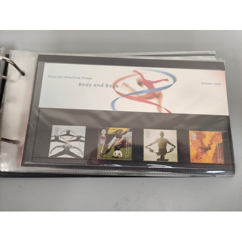 405 - Two albums of c1990s-2000s British mint presentation packs postage stamp sets comprising of 46 first... 